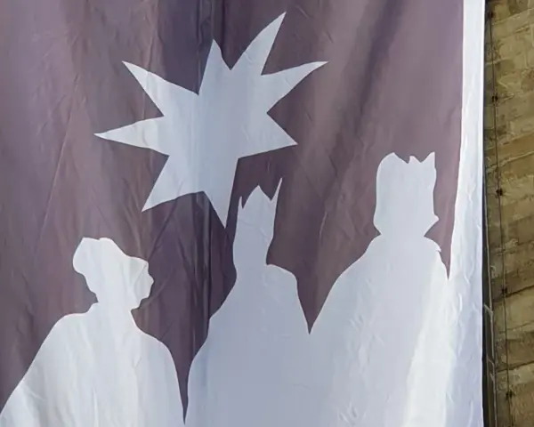 Banner mit Stern und drei Königen, die die **Epiphanie Bedeutung** symbolisieren.