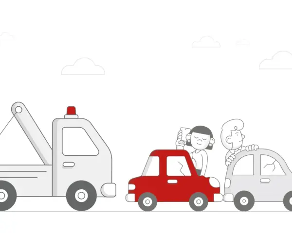Pomoc drogowa to coś, co ratuje w potrzebie. Holownik zabiera czerwone auto z pasażerami, a za nim stoi kolejne uszkodzone auto.