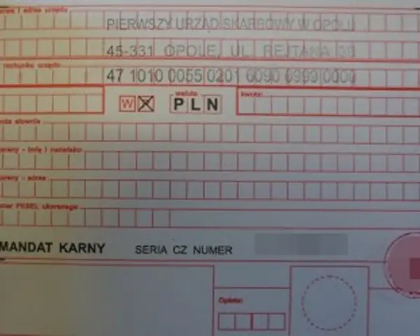 Mandat karny z danymi urzędu skarbowego i numerem identyfikatora zobowiązania mandat.