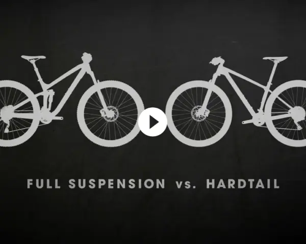 Silhouettes of a full suspension bike and a hardtail bike side-by-side, illustrating the difference between hard tail vs soft tail mountain bikes.