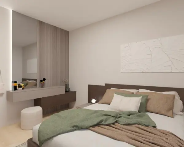 Camera da letto con idee originali: letto accogliente, specchio a parete, toeletta con cosmetici e appendiabiti.
