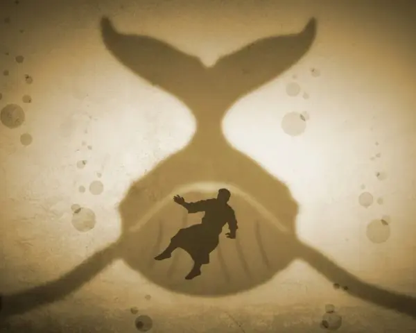 A silhouette of a man falls into the mouth of a giant whale, a classic sign of Jonah's story.