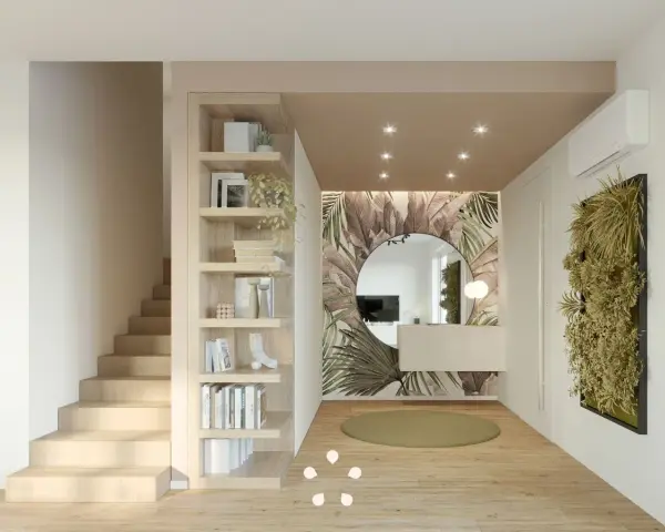 Ingresso ampio con libreria a giorno, scala in legno, specchio rotondo e carta da parati tropicale. Idee per come arredare un ingresso grande con stile.