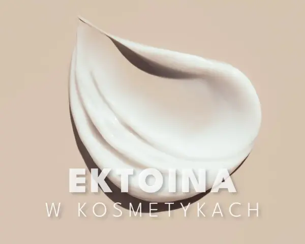 Smuga białego kremu kosmetycznego na beżowym tle z napisem "EKTOINA W KOSMETYKACH".
