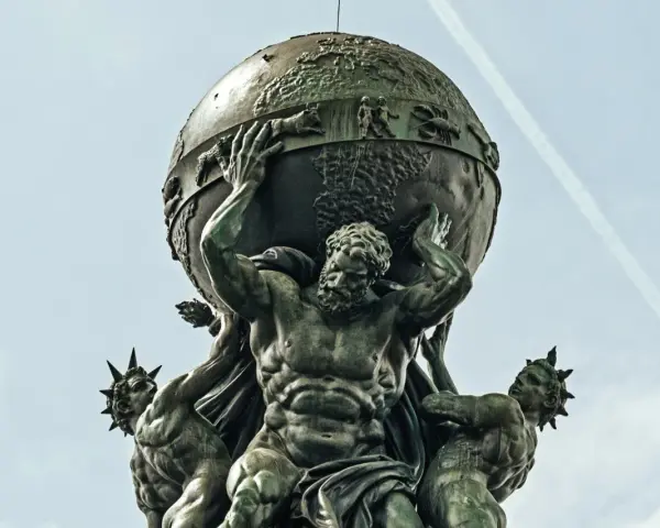 Atlas, punished for his role in the Titanomachy, bears the weight of the world. This bronze sculpture depicts him straining under the celestial sphere.