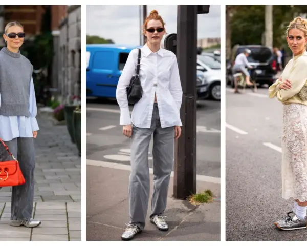 Tre donne sfoggiano un outfit elegante con sneakers donna: look casual chic con gilet grigio, camicia bianca e gonna in pizzo.