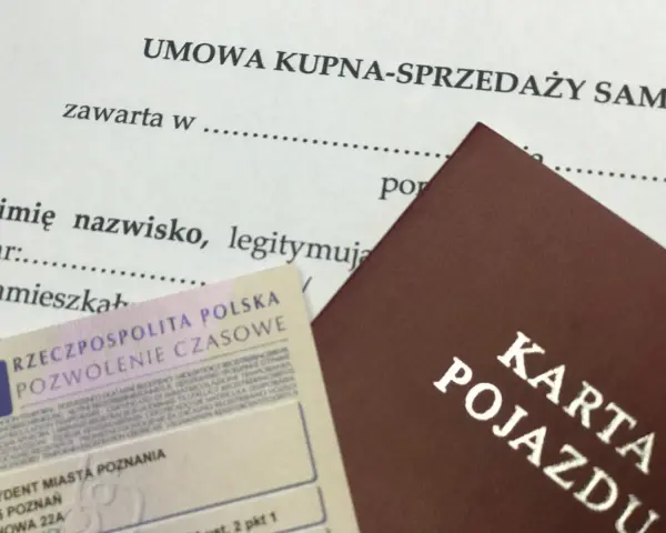 Umowa kupna-sprzedaży samochodu, dowód rejestracyjny i pozwolenie czasowe. Czy numer silnika jest potrzebny do umowy?