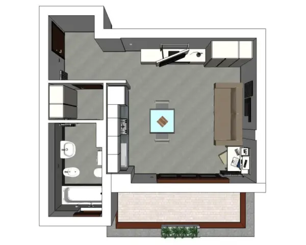 Pianta progetto casa 35 mq: bagno, cucina a vista, soggiorno con divano e tavolo, e un'area esterna pavimentata.