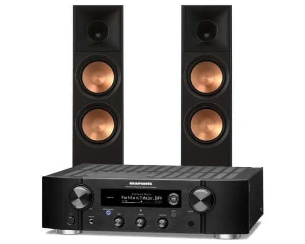 Marantz PM7000N z dwoma czarnymi kolumnami z miedzianymi membranami. Idealny zestaw do słuchania muzyki.