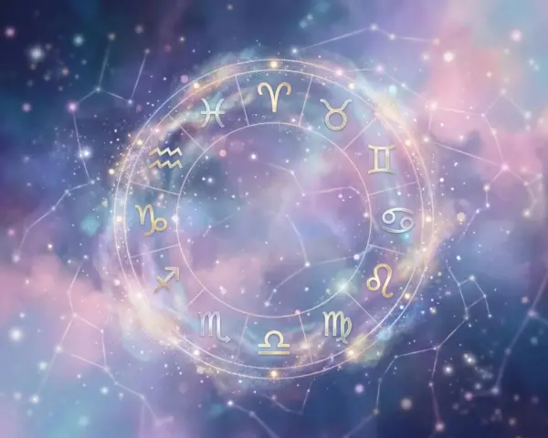 Złoty krąg zodiaku na tle kosmicznego nieba. Sprawdź swój wodnik horoskop dzienny i odkryj, co gwiazdy przygotowały dla Ciebie.