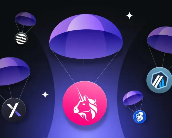 Co to jest airdrop kryptowaluty? Ilustracja pokazuje kilka tokenów kryptowalutowych spadających na spadochronach, symbolizując darmowe rozdawanie cyfrowych aktywów.