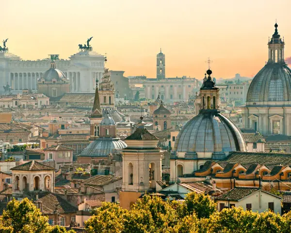 A breathtaking panorama of Rome's domes and rooftops at sunset, capturing the essence of Rome in one day.