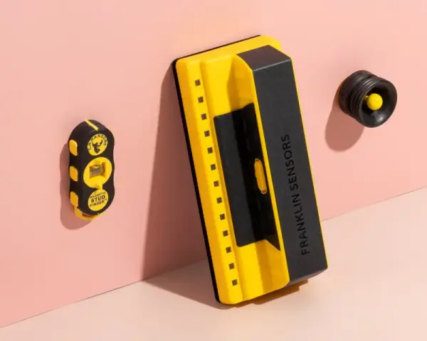 Two stud finders, one magnetic and one electronic, are shown. Learn how to use a stud finder for your next DIY project.