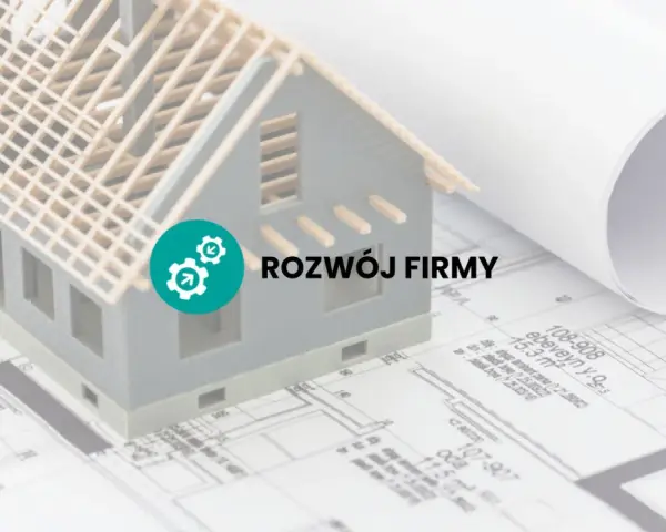 Model domu na planach, symbol rozwoju firmy. Jak założyć działalność gospodarczą i budować sukces.