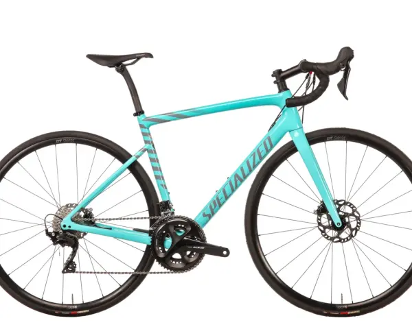 This turquoise Specialized road bike, with its sleek design and disc brakes, proves that specialized bikes are good for performance and style.