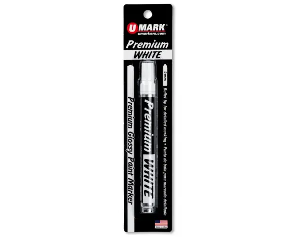 Rotulador blanco "Premium WHITE" de UMARK con punta de bala de 2mm, en su empaque.