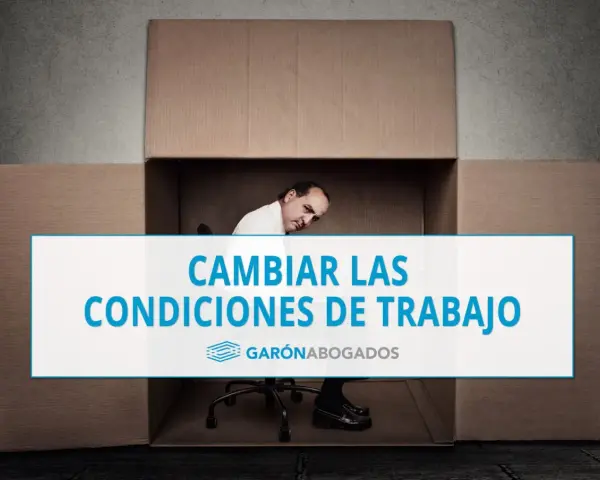Hombre dentro de una caja de cartón, con texto "CAMBIAR LAS CONDICIONES DE TRABAJO". Posible referencia al art. 41 ET.