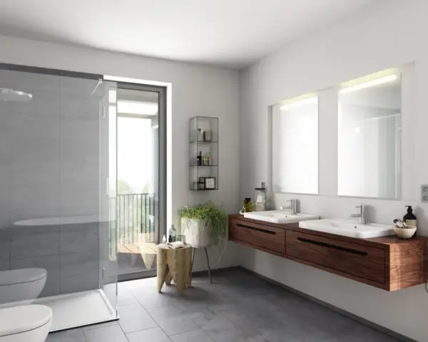 Salle de bain moderne avec douche, double vasque et carrelage gris. Le gris est la couleur la moins salissante pour une salle de bain.