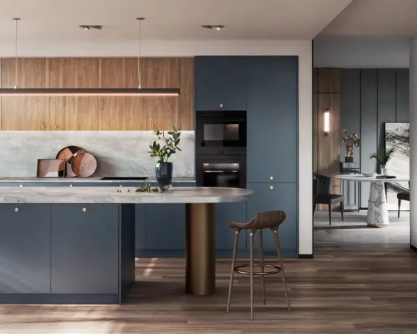 Elegantes cocinas azules con isla central, encimeras de mármol y detalles en madera. Un diseño moderno y sofisticado.