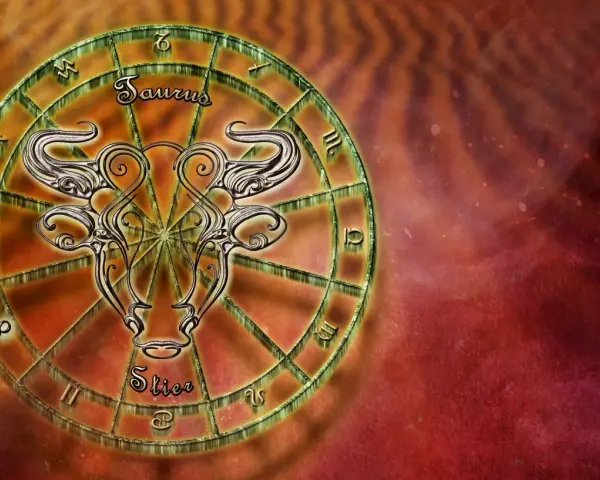 Znak zodiaku Byk (Taurus) w kole zodiakalnym, ozdobiony stylizowanym wizerunkiem głowy byka.