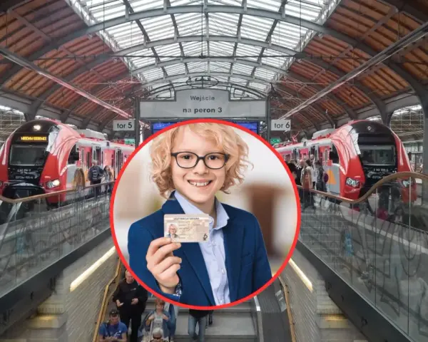 Chłopiec w okularach trzyma legitymację szkolną na tle dworca kolejowego z pociągami.