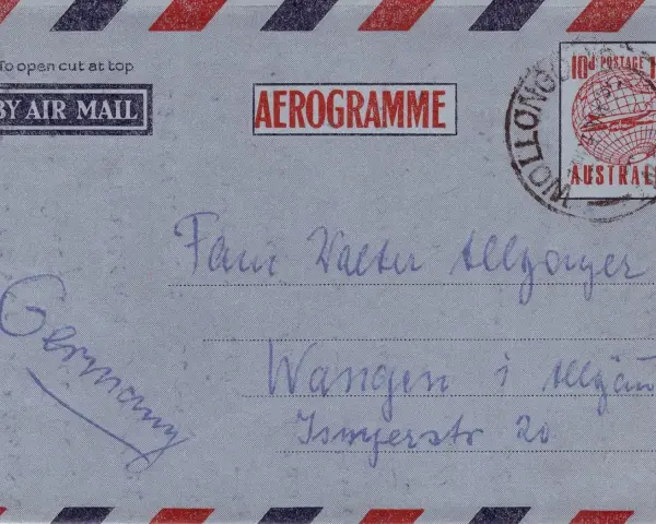 Aerogram z Niemiec do Australii. Na kopercie widnieje skrót "Szanowni Państwo" w formie odręcznego napisu.