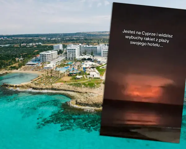 Widok na kurort na Cyprze. Na pierwszym planie widać turkusowe morze i plażę, a w tle białe budynki hotelowe. Na zdjęciu widnieje też napis: "Jesteś na Cyprze i widzisz wybuchy rakiet z plaży swojego hotelu...".