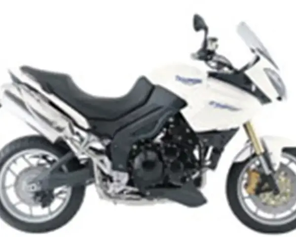 Biały motocykl turystyczny Triumph Tiger 1050. Poznaj jego dane techniczne i możliwości.