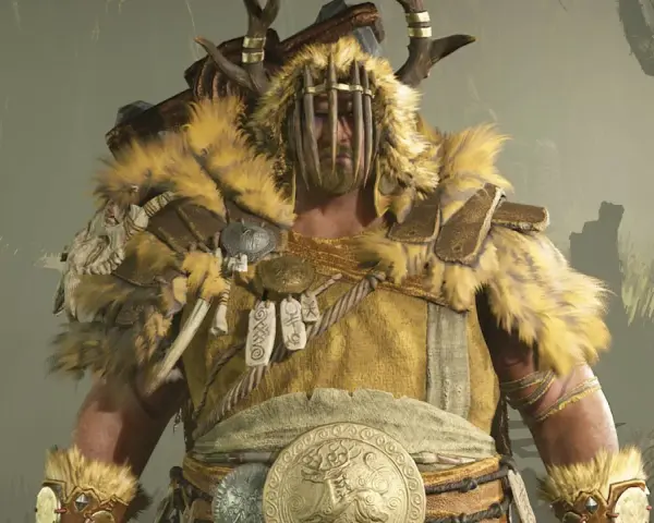 Un imponente druida de Diablo 4, con armadura de pieles y cuernos, listo para la batalla.