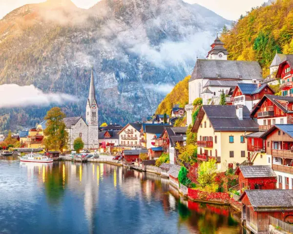Scenic Hallstatt, Austria, a picturesque village nestled by a lake, perfect for a train journey from Prague.