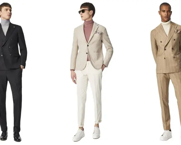 Tre uomini indossano eleganti completi spezzati, perfetti per un matrimonio moderno.
