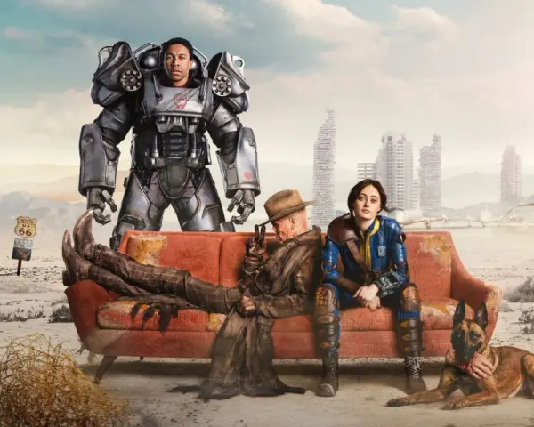 Postapokaliptyczna ekipa na kanapie, czekająca na Fallout 5. W tle zniszczone miasto i znak Route 66.
