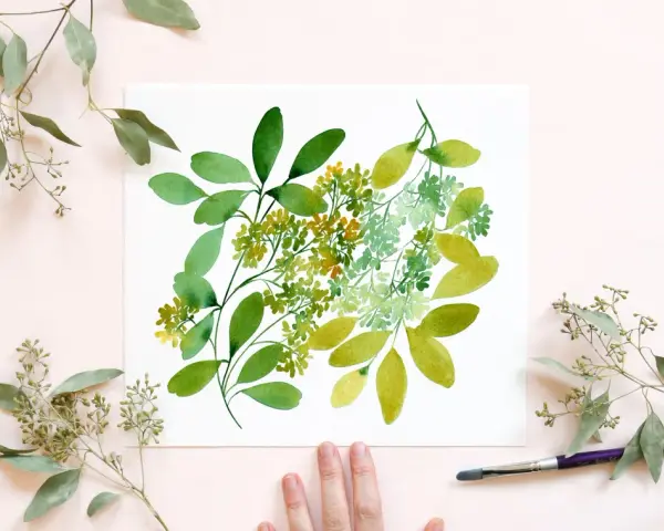 Une peinture à l'eucalyptus aquarelle, avec des touches de vert vif et des feuilles délicates, inspirée par la nature.