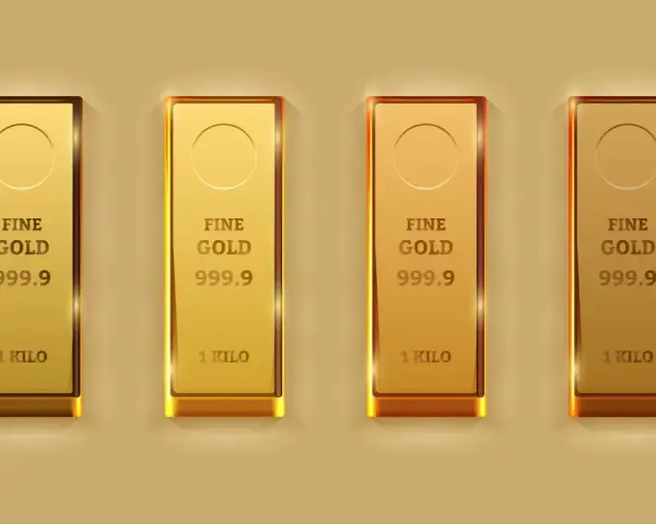 Quattro lingotti d'oro puro 999.9, ognuno da 1 chilo, brillano con la loro intrinseca densità oro.