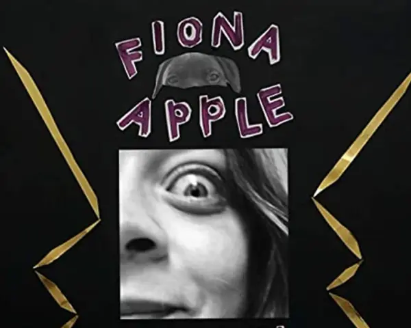 Fiona Apple, visage expressif, regard intense, entourée de lettres violettes et de pointes dorées.