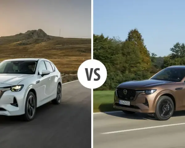 Dwa SUV-y Mazda CX-80: biały i brązowy, z napisem "VS" pośrodku.