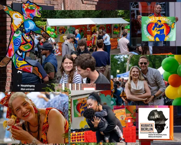 Bunte Kunstfigur und fröhliche Menschen beim **Carnival Berlin**. Ein Mann hält ein Plakat mit der Aufschrift "Danza de Coração".