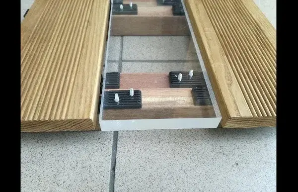 Jak przymocować deski do betonu - skuteczne metody i porady