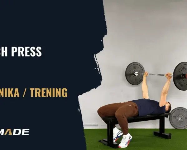 Technika bench press: mężczyzna ćwiczy na ławce, podnosząc sztangę. Poradnik jak sobie radzić z ciężarem.