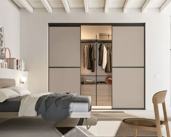 Camera da letto moderna con cabina armadio a vista, idee per organizzare lo spazio con stile.