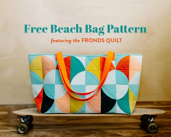 Bolso de playa acolchado con diseño geométrico de círculos y naranjas. ¡Descarga gratis patrones de bolsos de playa!