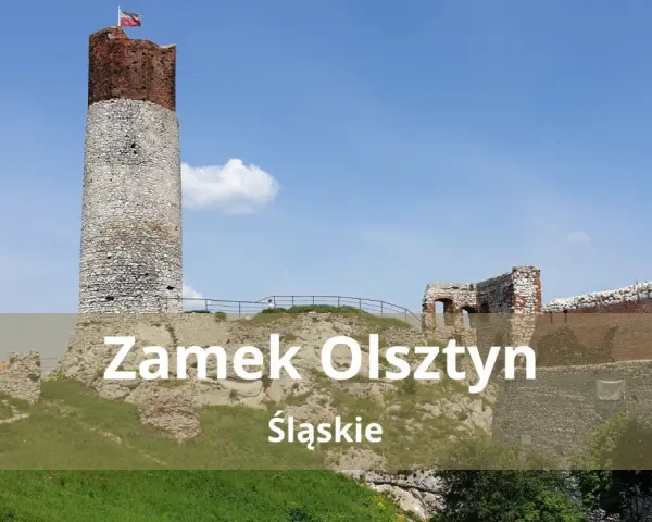 Zamek Olsztyn, ruiny średniowiecznej warowni na Jurze Krakowsko-Częstochowskiej, dumnie wznosi się na tle błękitnego nieba.