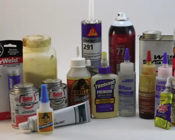 A collection of adhesives, including Gorilla Glue, JB Weld, and various Loctite products, ready for any repair job.