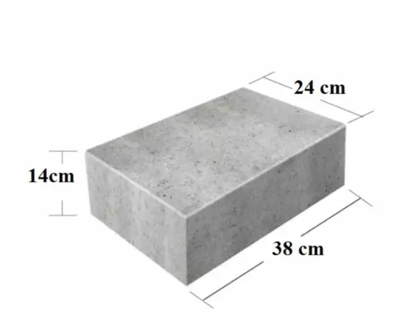 Szary bloczek betonowy o wymiarach 38x24x14 cm. Zastanawiasz się, ile waży bloczek betonowy?