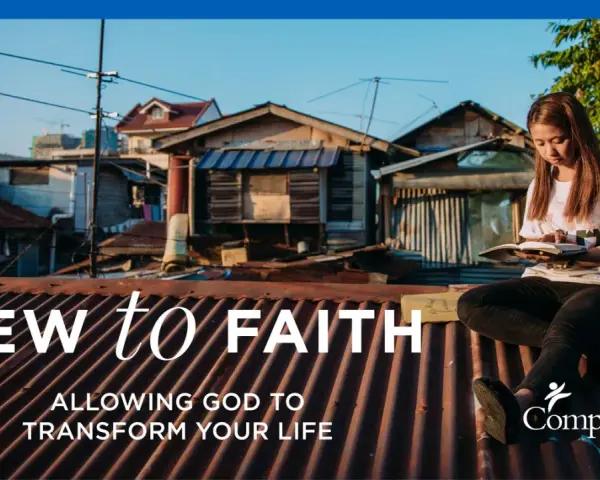 A young woman reads a Bible on a rooftop, embodying "New to Faith: Allowing God to Transform Your Life." This image reflects the biblical understanding of faith as a journey of transformation.