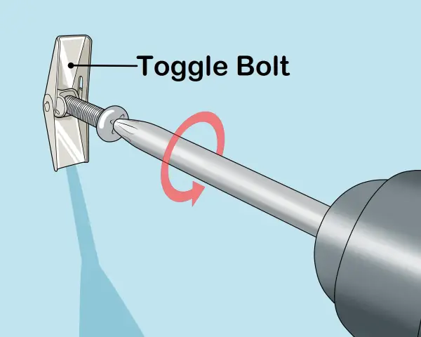 Utilisation d'un boulon à bascule pour accrocher un miroir au mur. La vis est insérée dans le mur et le mécanisme à bascule s'ouvre derrière la cloison sèche.