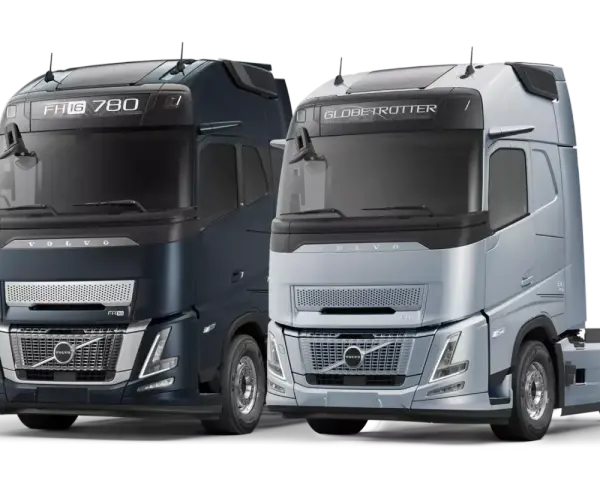 Dwa nowoczesne Volvo FH16 780 i FH Globetrotter, jedne z najlepszych ciężarówek na świecie, prezentują się na czarnym tle.