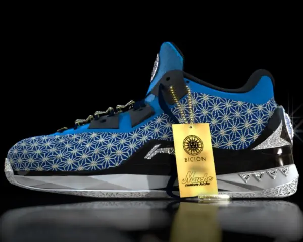 Niebieskie buty sportowe z białym wzorem, ozdobione diamentami i złotą metką. Prawdopodobnie najdroższe buty na świecie.