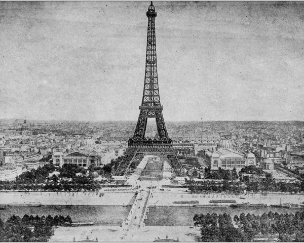La Torre Eiffel, un icono de París, se alza majestuosa sobre la ciudad. Su historia, ligada a la Exposición Universal de 1889, la convierte en un símbolo de progreso e ingeniería.