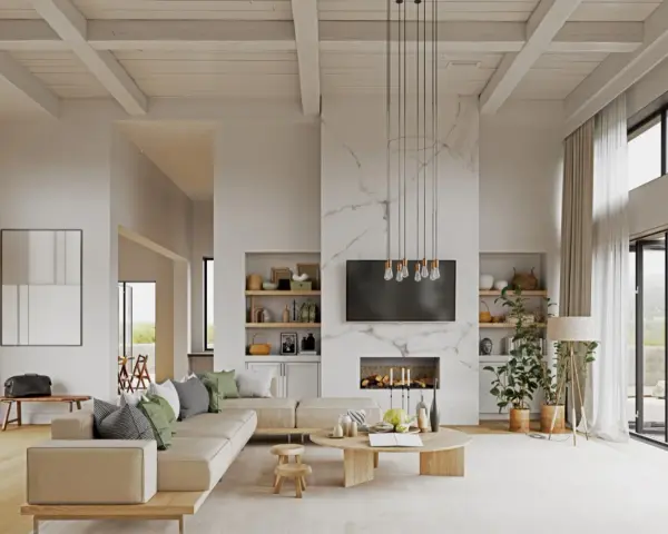 Soggiorno moderno con divano beige, camino in marmo e soffitto con travi a vista. Diversi tipi di bianco dominano l'ambiente, creando un'atmosfera luminosa e ariosa.